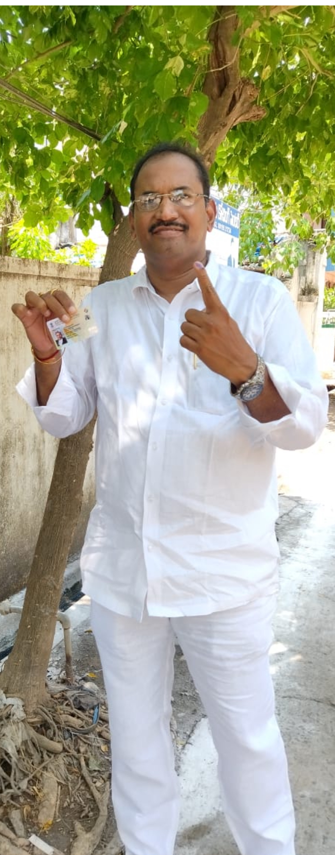 Sirigineedi Vijayakrishna at poling booth after cast his vote in 2024 general election